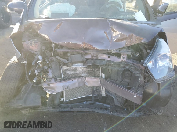 2014 Scion iQ z VIN JTNJJXB04EJ028369, wystawiony jako Copart lot #84030864 z przebiegiem Nie podano mil oraz Szkoda całkowita • Salvage title. Historia ofert i sprzedaży dostępna na DreamBid. Obrazek 11.