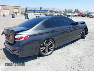 2020 BMW 5 Series M550i xDrive z VIN WBAJS7C07LBN96264, wystawiony jako IAAI lot #42478429 z przebiegiem 46 035 mil mil oraz . Historia ofert i sprzedaży dostępna na DreamBid. Obrazek 4.