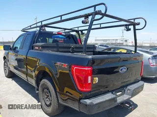 2023 Ford F-150 XL with VIN 1FTEX1C55PKE05056, listed as a IAAI auction lot 42466045 with 54,329 mi miles and . Bid and sale history available at DreamBid. Image 3.