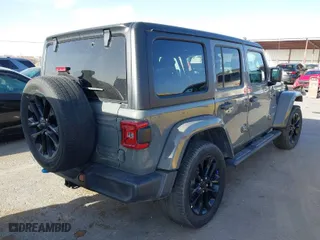 2023 Jeep Wrangler 4xe Sahara with VIN 1C4JJXP68PW661190, listed as a IAAI auction lot 41816483 with 41,877 mi miles. Bid and sale history available at carsss.com. Image 4.