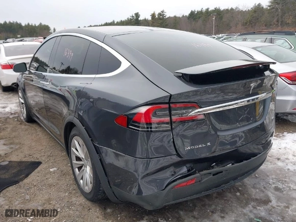 2016 Tesla Model X 70D with VIN 5YJXCAE2XGF014165, listed as a IAAI auction lot 41474490 with 112,967 mi miles. Bid and sale history available at carsss.com. Image 3.