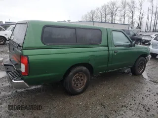 1998 Nissan Frontier XE with VIN 1N6DD21S4WC345165, listed as a Copart auction lot 87465104 with Not provided miles and Clean title. Bid and sale history available at DreamBid. Image 3.