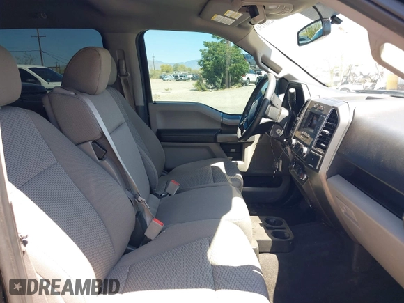 2018 Ford F-150 XL with VIN 1FTEW1C50JKF28600, listed as a IAAI auction lot 42081191 with 105,636 mi miles and . Bid and sale history available at DreamBid. Image 5.