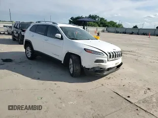 2017 Jeep Cherokee Latitude z VIN 1C4PJLCB6HW566120, wystawiony jako Copart lot #56361185 z przebiegiem 86 880 mil mil oraz Szkoda całkowita • Salvage title. Historia ofert i sprzedaży dostępna na DreamBid. Obrazek 13.