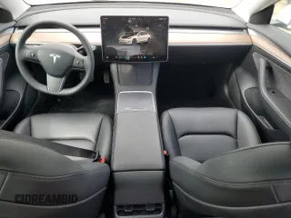 2023 Tesla Model 3 with VIN 5YJ3E1EA0PF575488, listed as a Copart auction lot 56889115 with 18,677 mi miles and Clean title. Bid and sale history available at DreamBid. Image 8.