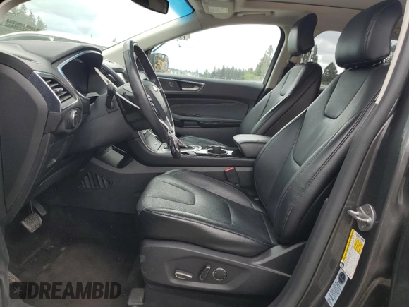 2015 Ford Edge Titanium z VIN 2FMTK4K84FBB09582, wystawiony jako Copart lot #55801915 z przebiegiem 72 533 mil mil oraz Szkoda całkowita • Salvage title. Historia ofert i sprzedaży dostępna na DreamBid. Obrazek 7.