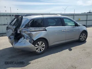 2016 Honda Odyssey SE with VIN 5FNRL5H36GB144433, listed as a Copart auction lot 48898755 with 192,442 mi miles and Salvage Title. Bid and sale history available at DreamBid. Image 3.