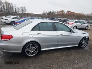 2014 Mercedes-Benz E 350 Luxury with VIN WDDHF8JB0EB075945, listed as a IAAI auction lot 41018546 with 66,678 mi miles and . Bid and sale history available at DreamBid. Image 14.