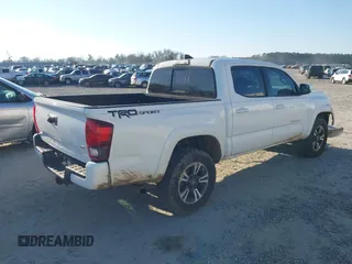 2018 Toyota Tacoma SR5 with VIN 3TMAZ5CN4JM062272, listed as a IAAI auction lot 41671472 with 114,566 mi miles and . Bid and sale history available at DreamBid. Image 4.