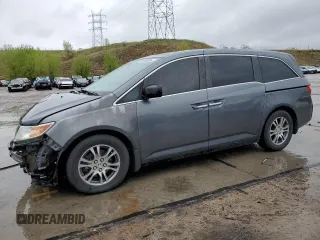 2013 Honda Odyssey EX-L z VIN 5FNRL5H65DB064563, wystawiony jako Copart lot #55980385 z przebiegiem 145 617 mil mil oraz Szkoda całkowita • Salvage title. Historia ofert i sprzedaży dostępna na DreamBid. Obrazek 1.