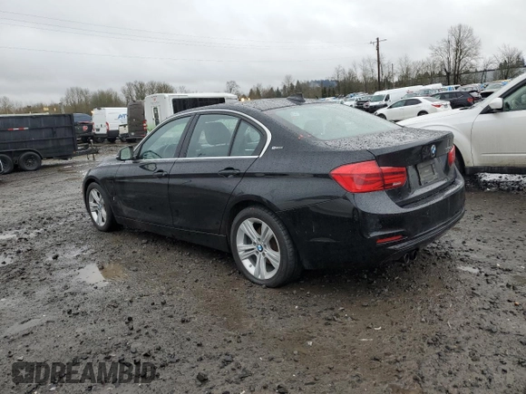 2017 BMW 3 Series 330e iPerformance with VIN WBA8E1C33HA029236, listed as a Copart auction lot 45122765 with 157,634 mi miles and Clean Title. Bid and sale history available at carsss.com. Image 2.