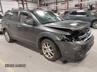 2014 Dodge Journey Limited with VIN 3C4PDDDG9ET204338, listed as a IAAI auction lot 41676032 with 223,129 mi miles and . Bid and sale history available at carsss.com. Image 1.