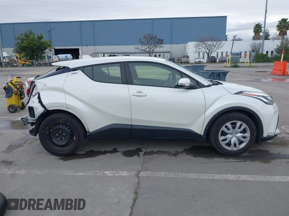 2021 Toyota C-HR LE with VIN JTNKHMBX1M1098521, listed as a IAAI auction lot 41539775 with 14,840 mi miles. Bid and sale history available at carsss.com. Image 14.