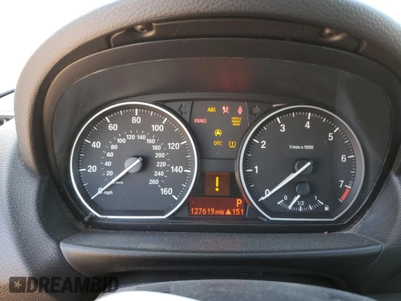 2010 BMW 1 Series 128i with VIN WBAUL7C5XAVJ77407, listed as a Copart auction lot 75903634 with 127,619 mi miles and Salvage title. Bid and sale history available at DreamBid. Image 9.