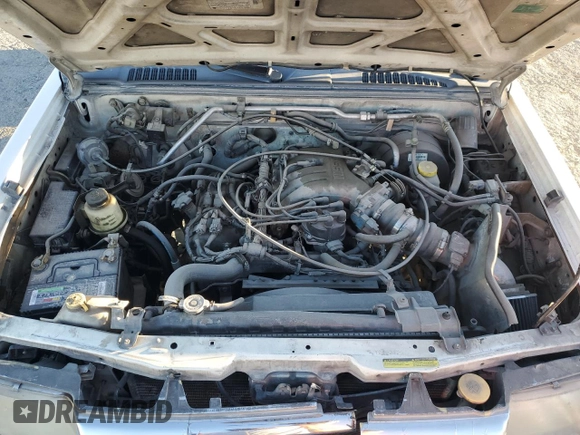 2000 Nissan Frontier XE z VIN 1N6ED27T3YC422129, wystawiony jako Copart lot #46668975 z przebiegiem 333 836 mil mil oraz Szkoda całkowita • Salvage title. Historia ofert i sprzedaży dostępna na DreamBid. Obrazek 12.