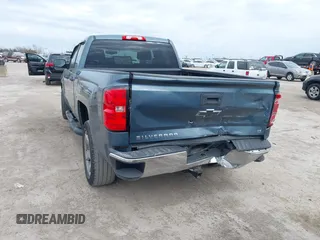 2014 Chevrolet Silverado 1500 LT with VIN 1GCRCREH4EZ296256, listed as a IAAI auction lot 41149836 with 116,955 mi miles and . Bid and sale history available at DreamBid. Image 6.