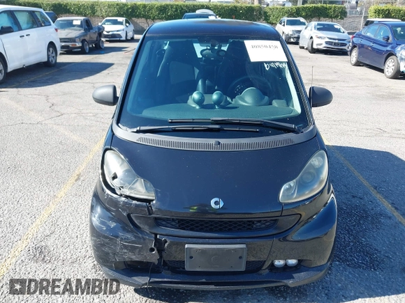 2009 Smart fortwo Pure z VIN WMEEJ31X49K218655, wystawiony jako IAAI lot #40850458 z przebiegiem 243 075 mil mil oraz . Historia ofert i sprzedaży dostępna na DreamBid. Obrazek 11.