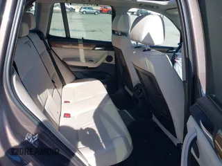 2012 BMW X3 28i with VIN 5UXWX5C53CL719786, listed as a IAAI auction lot 41857244 with 94,911 mi miles and . Bid and sale history available at DreamBid. Image 7.