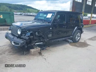 2021 Jeep Wrangler Unlimited Sahara with VIN 1C4HJXEN4MW610287, listed as a IAAI auction lot 42538525 with 24,861 mi miles and . Bid and sale history available at DreamBid. Image 18.