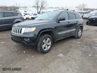 2011 Jeep Grand Cherokee Laredo with VIN 1J4RR4GGXBC511475, listed as a IAAI auction lot 41554620 with 164,361 mi miles. Bid and sale history available at carsss.com. Image 17.