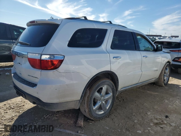 2013 Dodge Durango Citadel with VIN 1C4SDHET3DC680432, listed as a Copart auction lot 86819304 with 219,080 mi miles and Salvage Title. Bid and sale history available at carsss.com. Image 3.