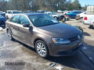 2014 Volkswagen Jetta Sedan SE w/Connectivity with VIN 3VWD07AJ1EM361255, listed as a IAAI auction lot 41385849 with 166,124 mi miles. Bid and sale history available at carsss.com. Image 1.