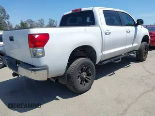 2008 Toyota Tundra z VIN 5TFEV54118X038542, wystawiony jako IAAI lot #42265229 z przebiegiem 148 546 mil mil oraz . Historia ofert i sprzedaży dostępna na DreamBid. Obrazek 4.