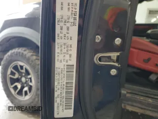 2016 Ram 1500 Rebel with VIN 1C6RR7YT6GS105815, listed as a Copart auction lot 54253235 with 150,511 mi miles and Salvage title. Bid and sale history available at DreamBid. Image 12.