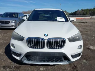 2017 BMW X1 xDrive28i with VIN WBXHT3C37H5F69725, listed as a IAAI auction lot 41588095 with 109,704 mi miles. Bid and sale history available at carsss.com. Image 12.