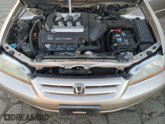 2001 Honda Accord LX z VIN 1HGCG16461A067174, wystawiony jako Copart lot #87543245 z przebiegiem 148 410 mil mil oraz Czysty tytuł • Clean title. Historia ofert i sprzedaży dostępna na DreamBid. Obrazek 11.