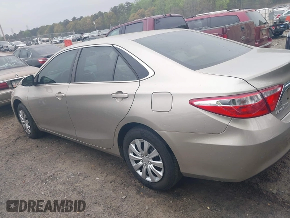 2015 Toyota Camry XLE with VIN 4T1BF1FK2FU992015, listed as a IAAI auction lot 41928373 with 95,570 mi miles and . Bid and sale history available at DreamBid. Image 14.