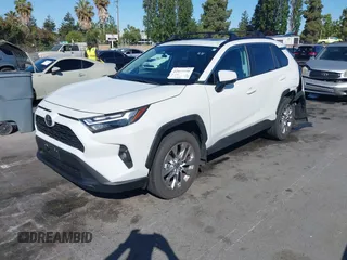 2023 Toyota RAV4 XLE Premium with VIN 2T3C1RFV7PW299428, listed as a IAAI auction lot 42527306 with 9,853 mi miles and . Bid and sale history available at DreamBid. Image 2.