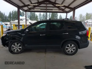 2011 Kia Sorento LX with VIN 5XYKTDA24BG170561, listed as a IAAI auction lot 42011756 with 211,833 mi miles. Bid and sale history available at carsss.com. Image 14.