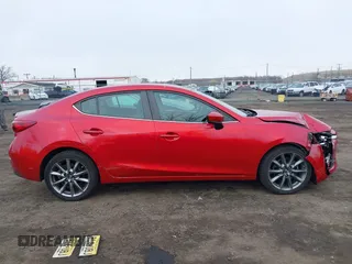 2018 Mazda 3 Touring with VIN 3MZBN1V36JM196315, listed as a IAAI auction lot 41856596 with 79,783 mi miles and . Bid and sale history available at DreamBid. Image 13.