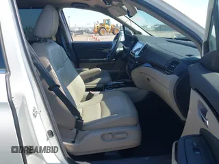 2018 Honda Pilot Touring with VIN 5FNYF6H95JB019122, listed as a IAAI auction lot 42439283 with 128,848 mi miles and . Bid and sale history available at DreamBid. Image 5.