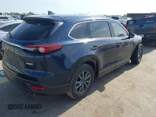 2020 Mazda CX-9 Touring with VIN JM3TCACY1L0419630, listed as a IAAI auction lot 42282675 with 105,207 mi miles and . Bid and sale history available at DreamBid. Image 4.