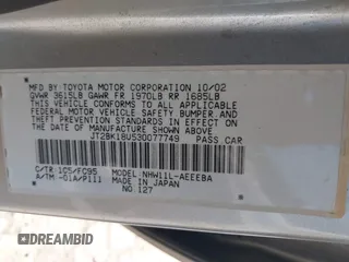 2003 Toyota Prius with VIN JT2BK18U530077749, listed as a IAAI auction lot 41227741 with 91,524 mi miles. Bid and sale history available at carsss.com. Image 9.