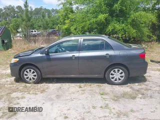 2011 Toyota Corolla L with VIN 2T1BU4EE0BC680158, listed as a IAAI auction lot 42060987 with 131,669 mi miles. Bid and sale history available at carsss.com. Image 14.