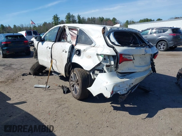 2019 Acura MDX Technology z VIN 5J8YD4H58KL020708, wystawiony jako IAAI lot #42047281 z przebiegiem 101 084 mil mil oraz . Historia ofert i sprzedaży dostępna na DreamBid. Obrazek 3.