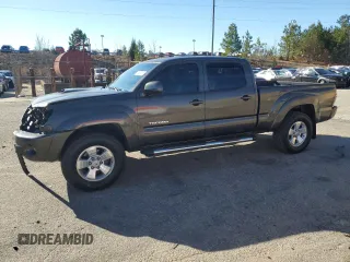 2010 Toyota Tacoma PreRunner with VIN 3TMKU4HN3AM025218, listed as a Copart auction lot 87600035 with 92,605 mi miles and Salvage title. Bid and sale history available at DreamBid. Image 1.