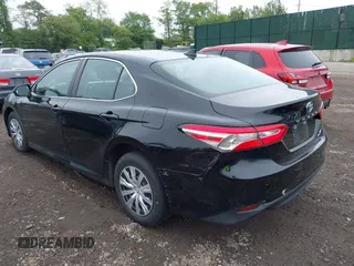 2019 Toyota Camry Hybrid LE z VIN 4T1B31HK5KU510055, wystawiony jako IAAI lot #42325522 z przebiegiem 97 000 mil mil oraz . Historia ofert i sprzedaży dostępna na DreamBid. Obrazek 3.