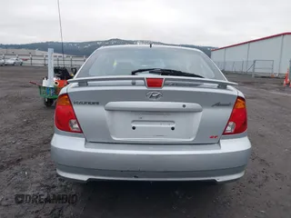 2005 Hyundai Accent GLS with VIN KMHCG35C25U359293, listed as a IAAI auction lot 41233474 with 148,344 mi miles. Bid and sale history available at carsss.com. Image 16.