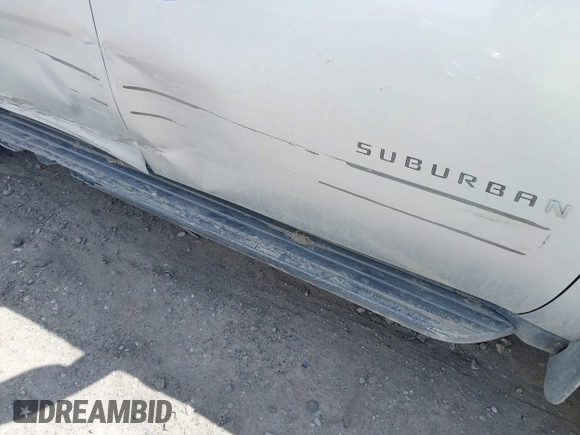 2013 Chevrolet Suburban LT with VIN 1GNSKJE78DR108955, listed as a IAAI auction lot 42004032 with 114,729 mi miles and . Bid and sale history available at DreamBid. Image 21.
