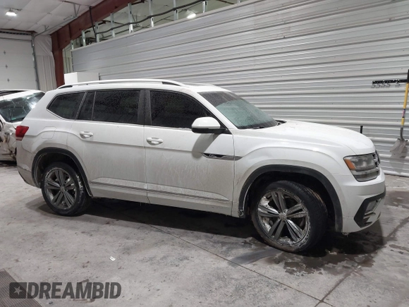 2019 Volkswagen Atlas SE z VIN 1V2XR2CA0KC595596, wystawiony jako IAAI lot #41410019 z przebiegiem 103 336 mil mil oraz . Historia ofert i sprzedaży dostępna na DreamBid. Obrazek 14.