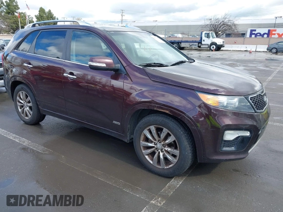 2012 Kia Sorento SX z VIN 5XYKWDA25CG283654, wystawiony jako IAAI lot #41803333 z przebiegiem 271 807 mil mil oraz . Historia ofert i sprzedaży dostępna na DreamBid. Obrazek 1.