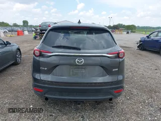 2016 Mazda CX-9 Sport z VIN JM3TCABYXG0126543, wystawiony jako IAAI lot #42256448 z przebiegiem 133 813 mil mil oraz . Historia ofert i sprzedaży dostępna na DreamBid. Obrazek 16.