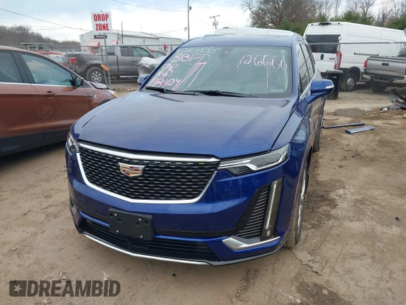 2023 Cadillac XT6 AWD Premium Luxury with VIN 1GYKPDRS2PZ126666, listed as a IAAI auction lot 40963833 with 23,535 mi miles and . Bid and sale history available at DreamBid. Image 18.