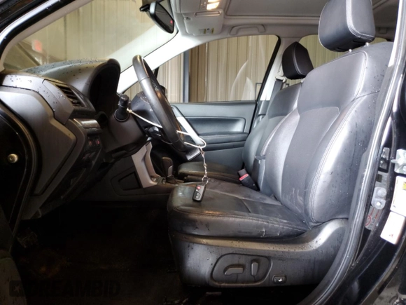 2015 Subaru Forester Touring with VIN JF2SJAUC0FH467740, listed as a Copart auction lot 50028885 with 131,830 mi miles and Clean Title. Bid and sale history available at DreamBid. Image 7.