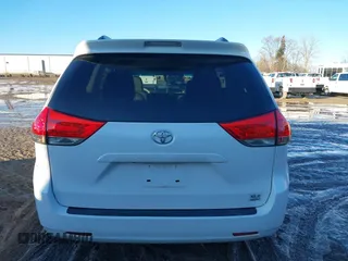 2012 Toyota Sienna XLE with VIN 5TDDK3DC4CS042464, listed as a IAAI auction lot 41199300 with 143,677 mi miles. Bid and sale history available at carsss.com. Image 16.