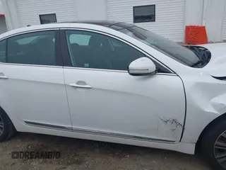 2016 Kia Cadenza Premium with VIN KNALN4D71G5213580, listed as a IAAI auction lot 41306716 with 124,664 mi miles. Bid and sale history available at carsss.com. Image 13.